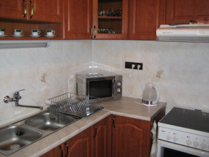 kuchyňský kout je vybaven pro vaření a stolování 8 až 10 osob