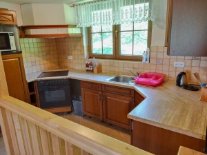 kuchyňský kout v obytné místnosti v podkroví