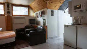 Valašský apartmán - pokoj s rozkládacím gaučem a kuchyňským koutem