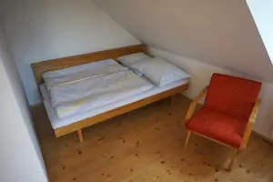 ložnice se 2 lůžky a rozkládacím gaučem pro 1 až 2 osoby