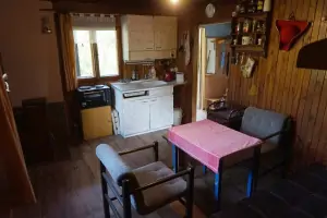 obytný pokojík s kuchyňským koutem