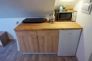 kuchyňský kout v apartmánu