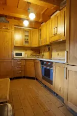 kuchyňský kout ve výklenku obytné místnosti
