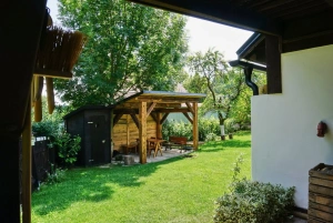 pergola s venkovním posezením a ohniště