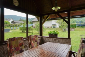 pergola s posezením a zahradním krbem