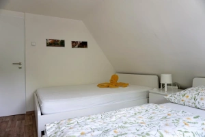 ložnice se 2 dvojlůžky v podkroví