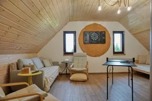 společenská místnost - gauč, el. terč