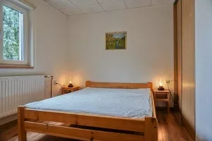 ložnice s dvojlůžkem a lůžkem