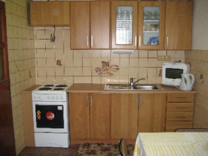Kuchyně je vybavená pro vaření a stolování 9 až 11 osob