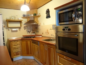 kuchyňský kout je plně vybaven pro vaření a stolování 14 osob