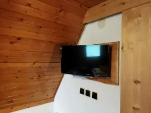TV v podkrovní ložnici