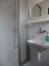 Sprchový kout v koupelně v podkroví